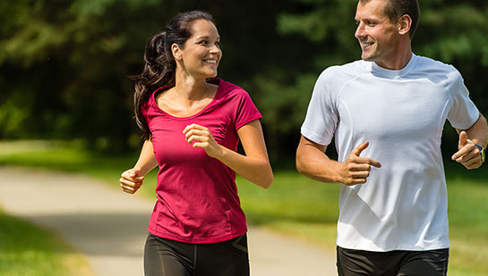 Husband and Wife out on a jog follow health advice from Ohio chiropractor