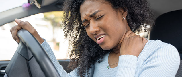 Woman suffering from neck pain after car accident Ohio